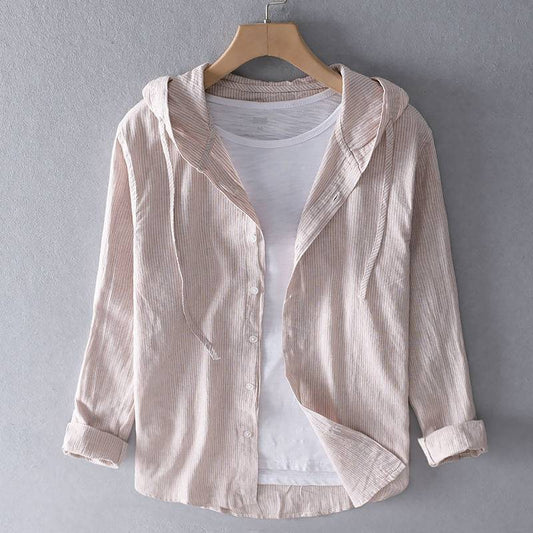 A hooded long-sleeved solid-color shirt